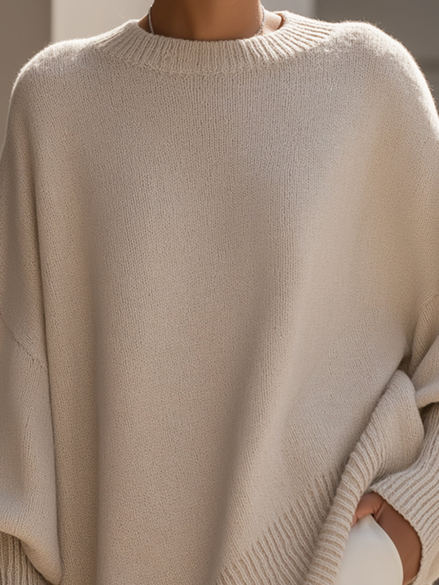 Oversized draped wide-neck sweater in light beige with ribbed cuffs and hem