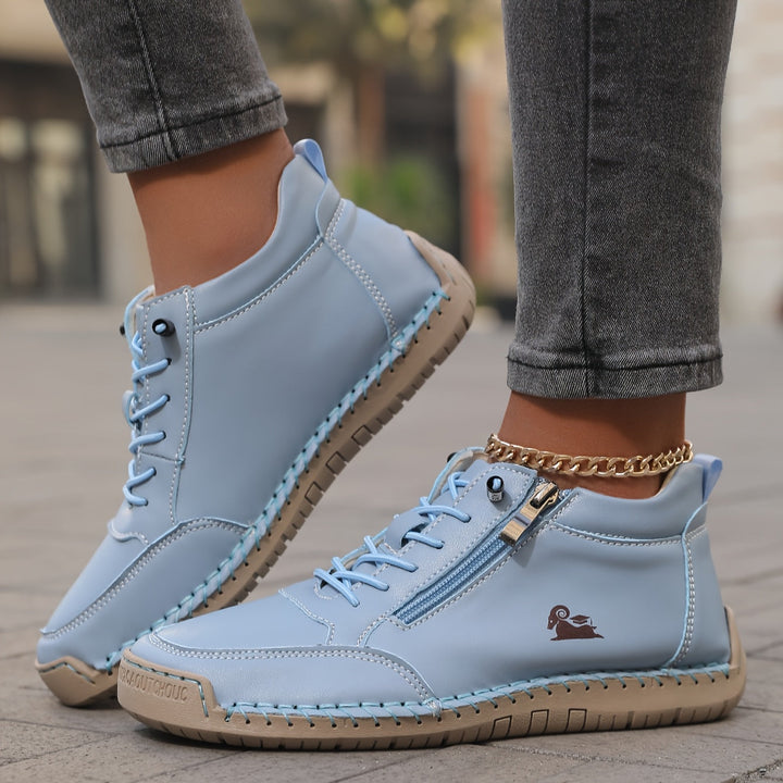 Light blue lace-up comfort shoes with side zipper and decorative stitching