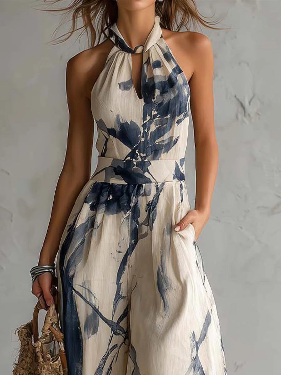 Jumpsuit with American neckline and washed ink print, featuring pockets and wide leg