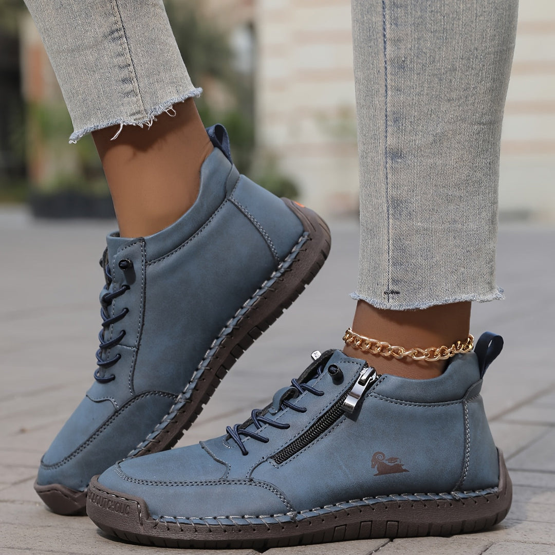 Light blue lace-up comfort shoes with side zipper and gold chain strap