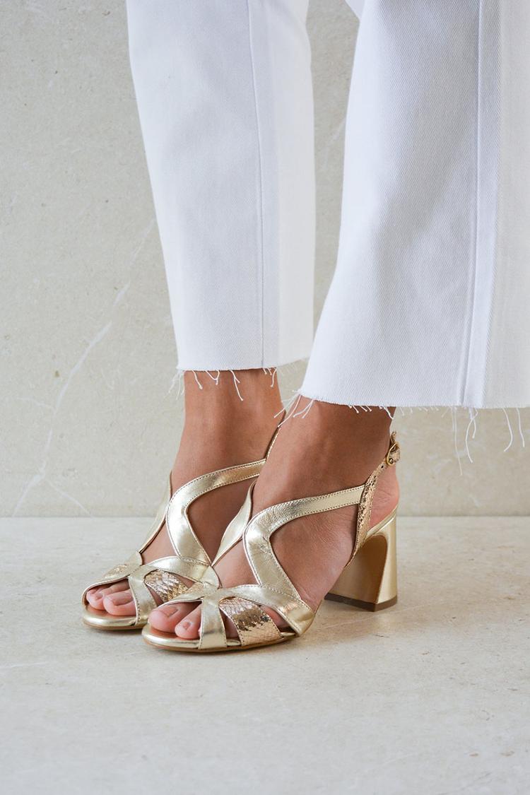 Wide cut-out glossy peep toe heels with an irregular design