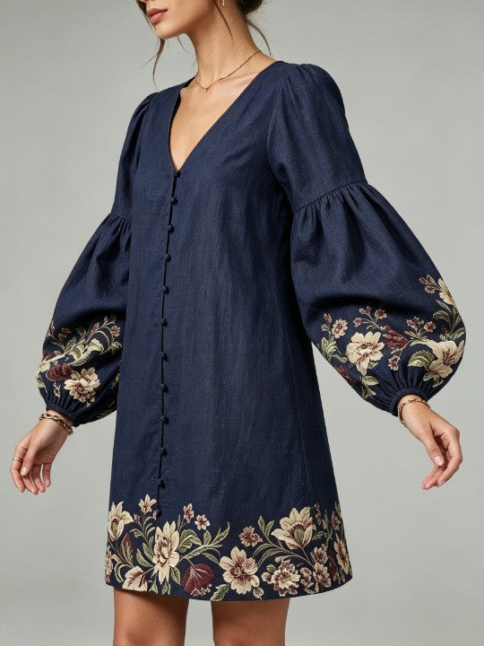 Navy blue mini dress made of cotton and linen, with a V-neck and lantern sleeves, in a floral pattern