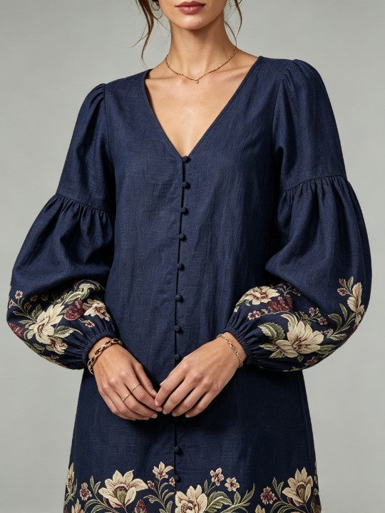 Navy blue mini dress made of cotton and linen, with a V-neck and lantern sleeves, in a floral pattern