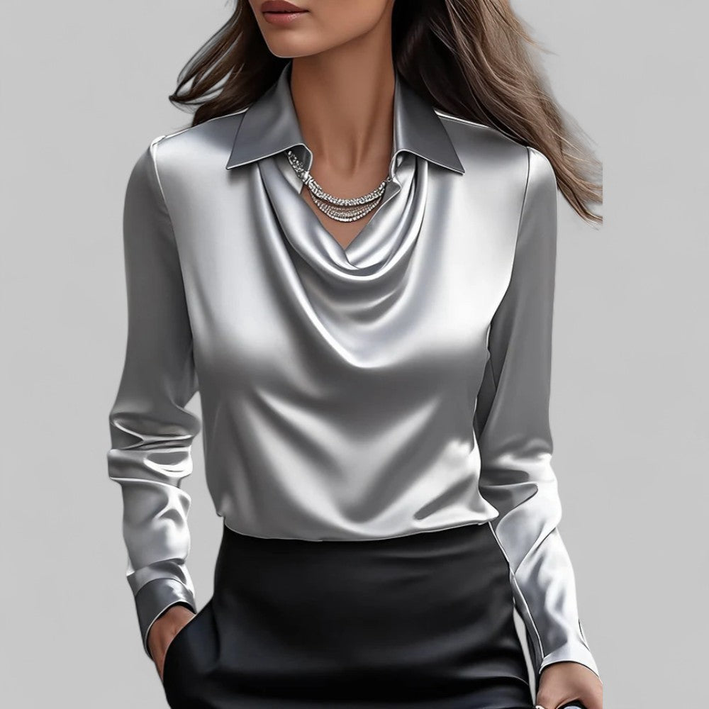 Satin draped cowl-neck blouse in light gray-blue with long sleeves and collar.