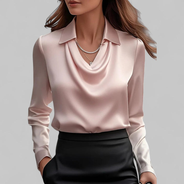Champagne satin draped cowl-neck blouse with long sleeves and pointed collar.