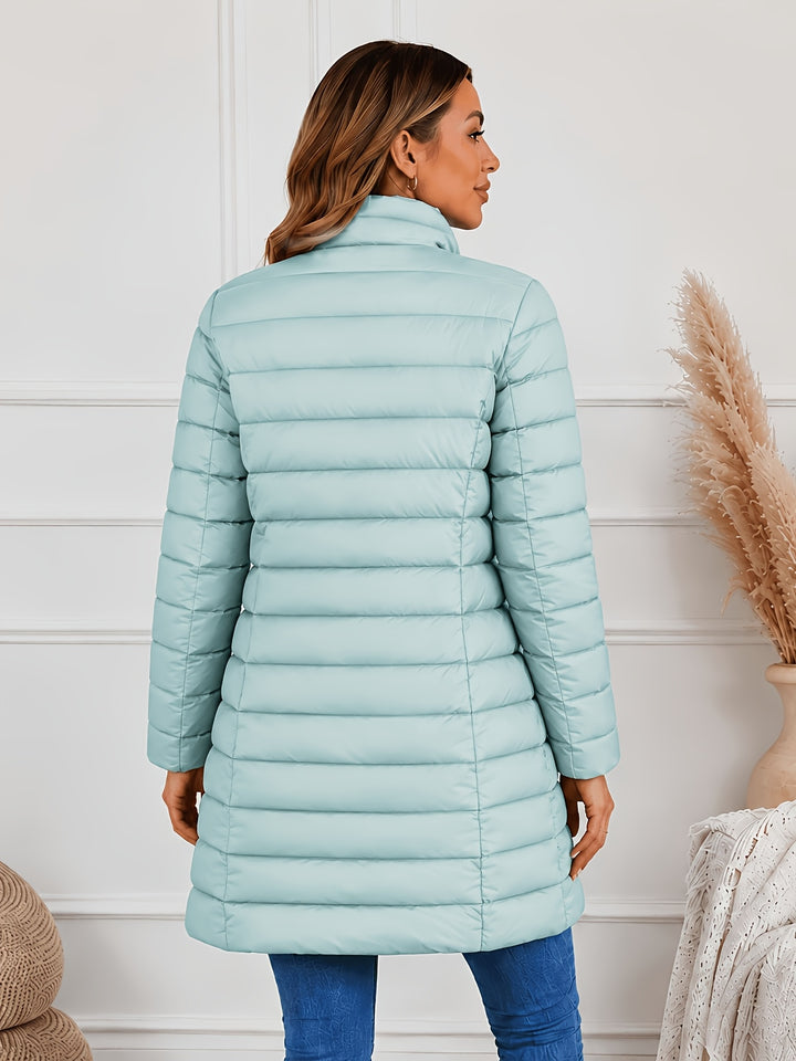 Lightweight quilted coat with stand collar and double zip front, light cyan puffer, back view.