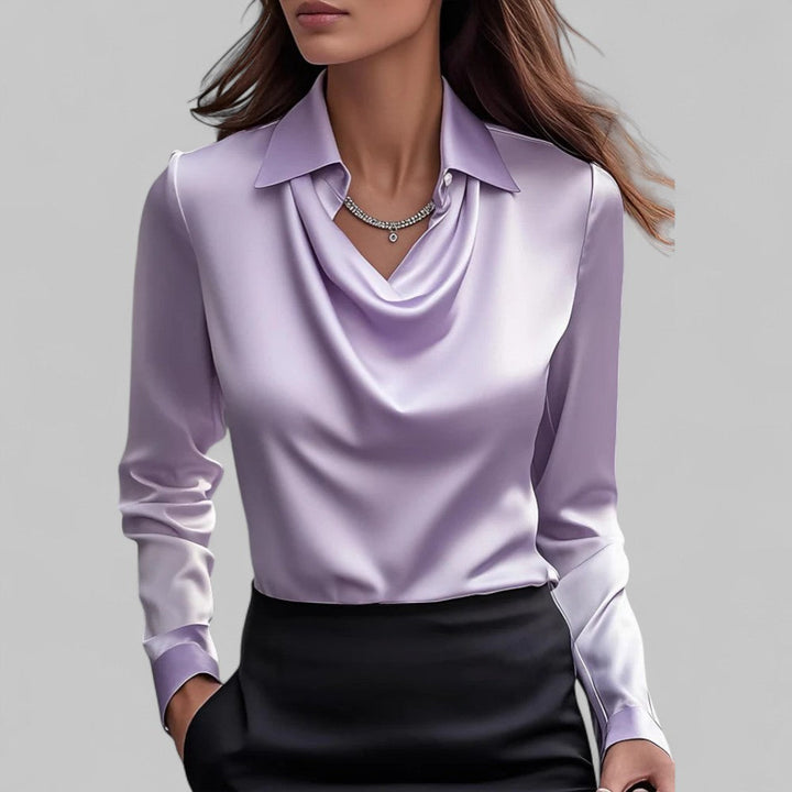 Lavender satin draped cowl-neck blouse with long sleeves and pointed collar.