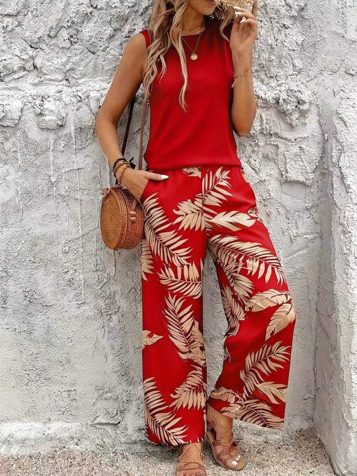 Two-piece botanical wide-leg set with sleeveless top, red with cream leaf print trousers