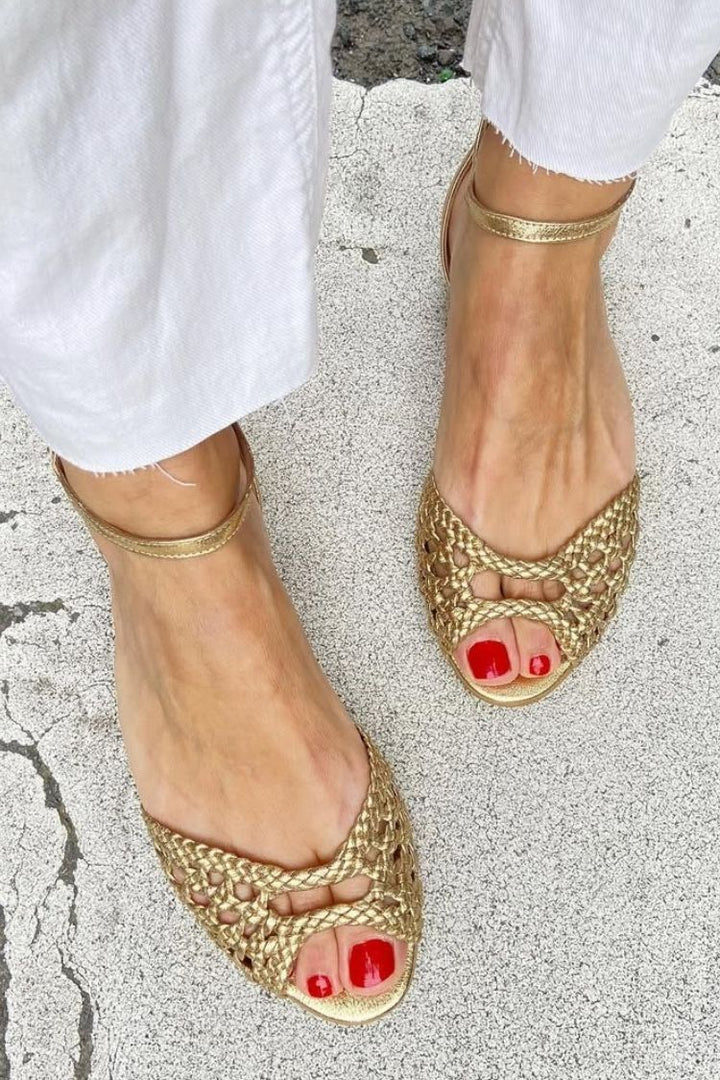 Elegant low cut-out woven sandals with open toe and ankle strap