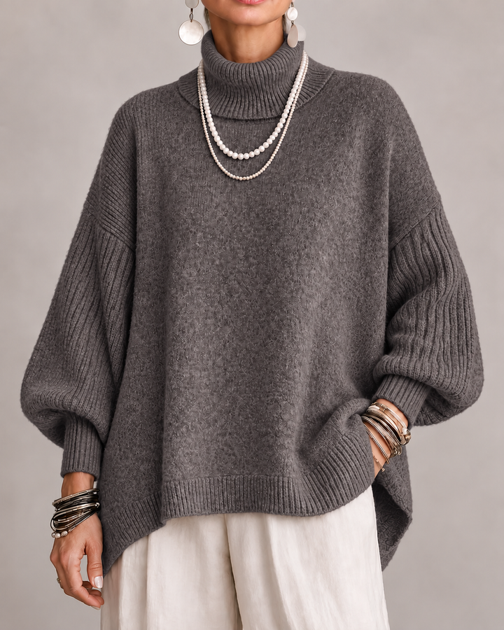 Grey turtleneck knit sweater with relaxed wide sleeves