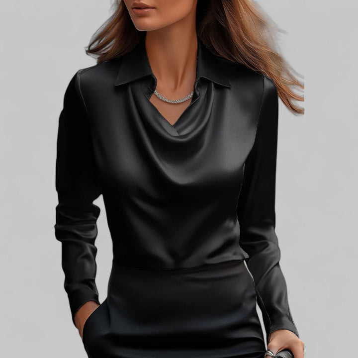 Black satin draped cowl-neck blouse with long sleeves and pointed collar.