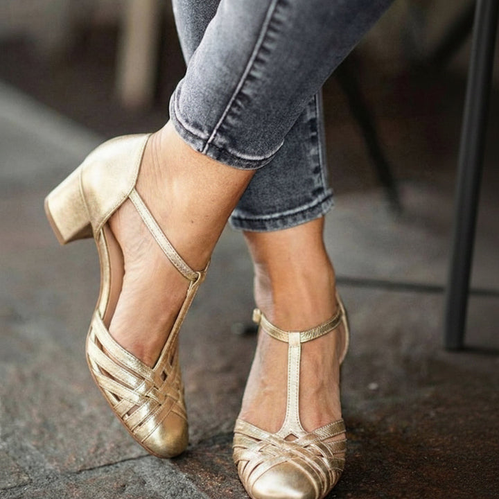 Elegant metallic Mary Jane court shoes with T-strap and block heel