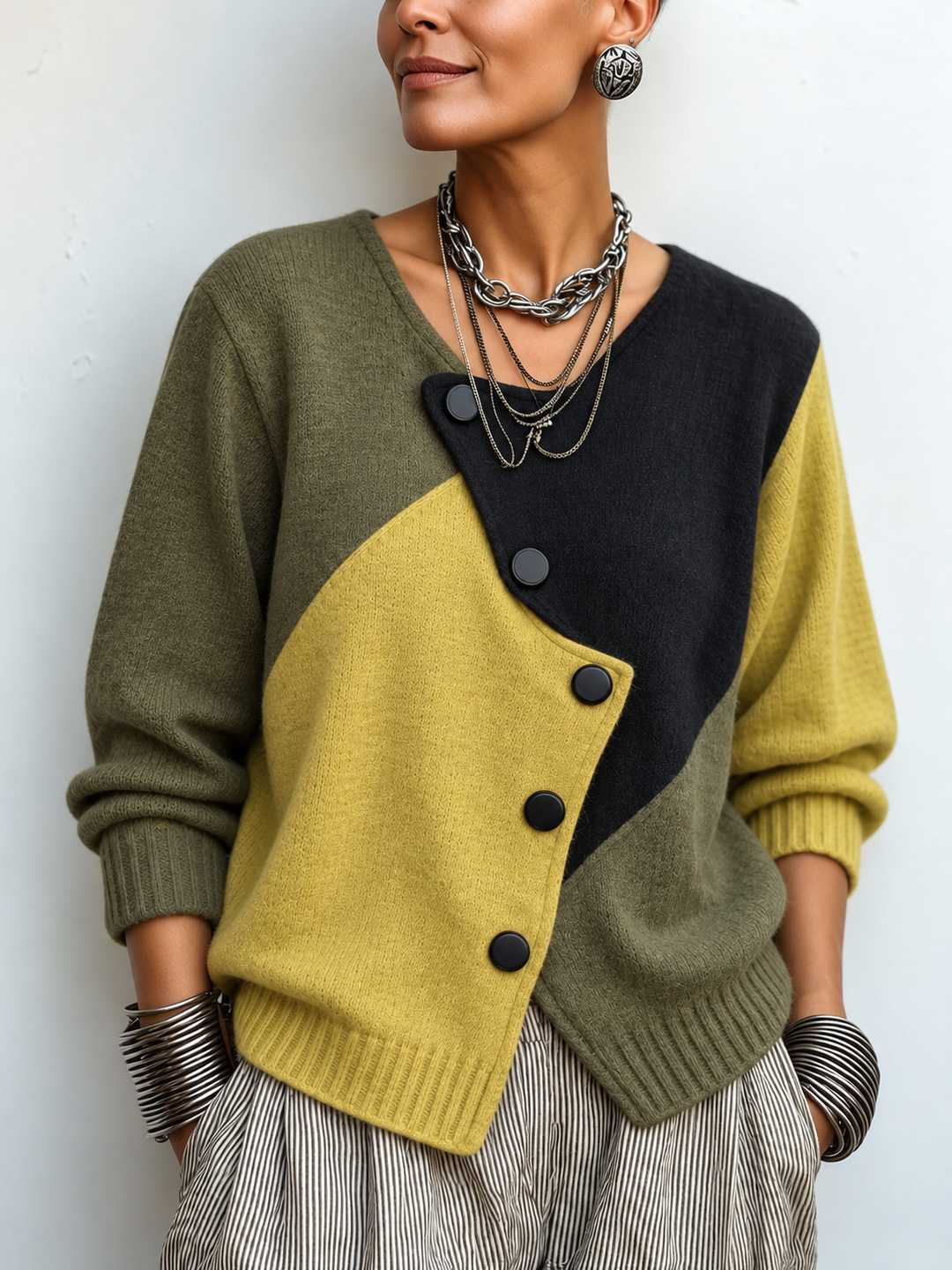 Asymmetric colourblock sweater in olive, dark and mustard yellow with button front
