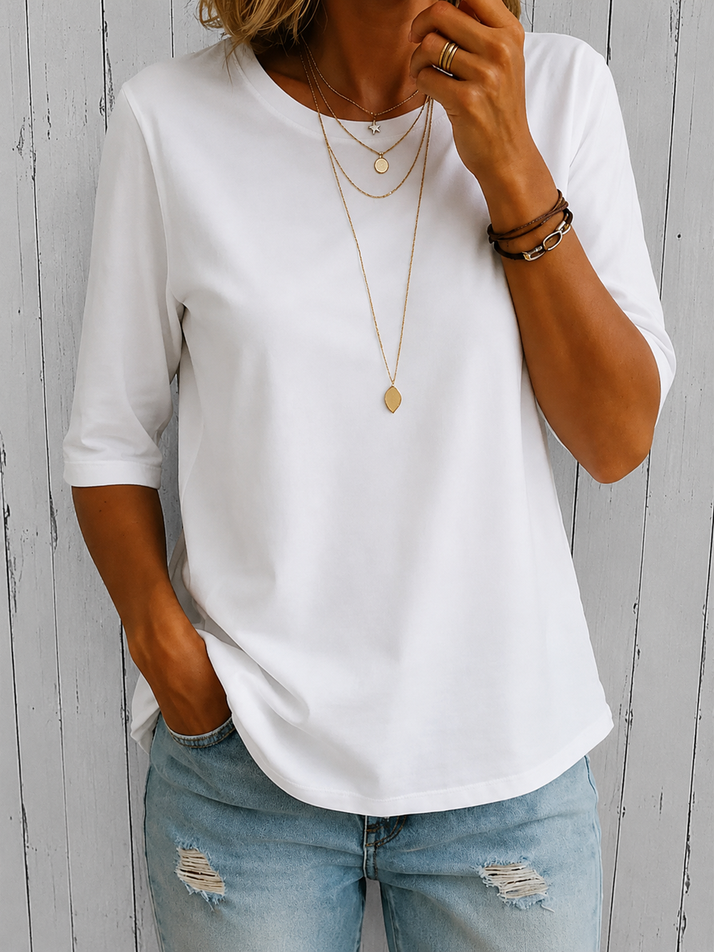 White three-quarter sleeve tee with crew neck