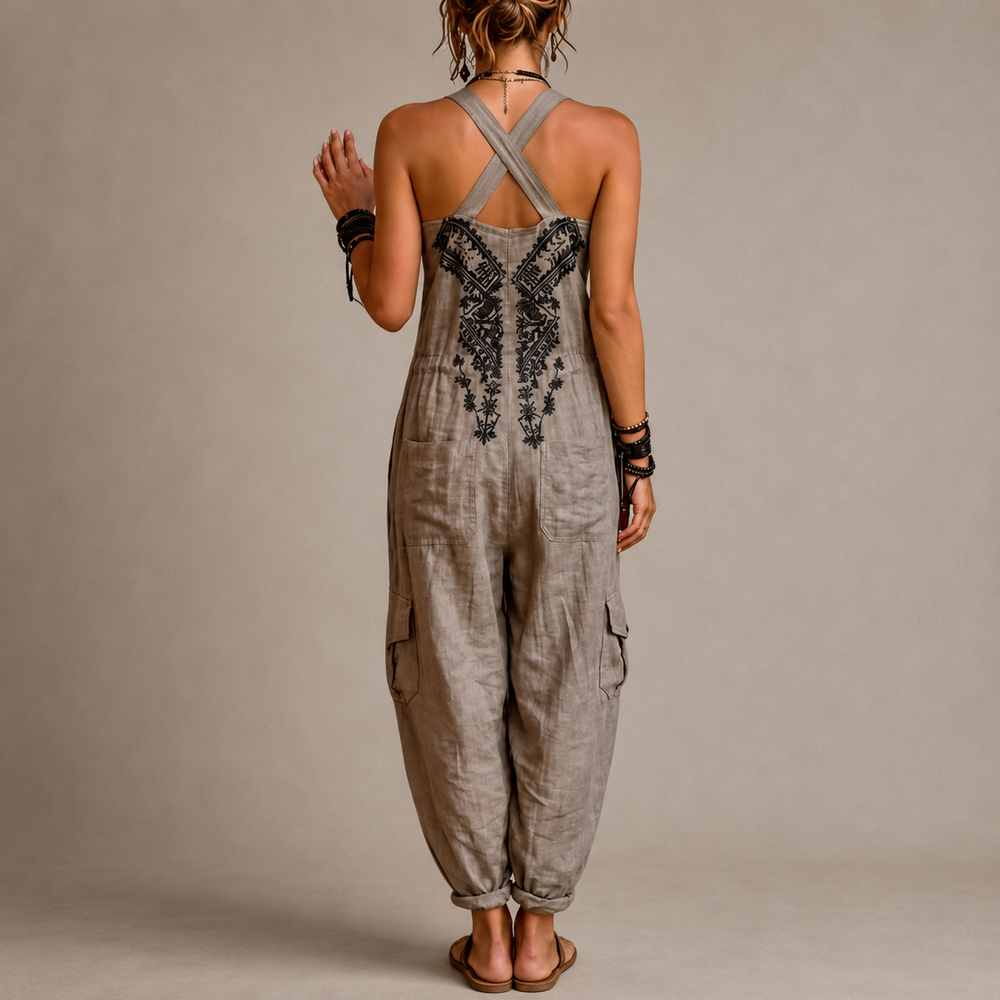 Light grey boho jumpsuit with crisscross back straps and central embroidery
