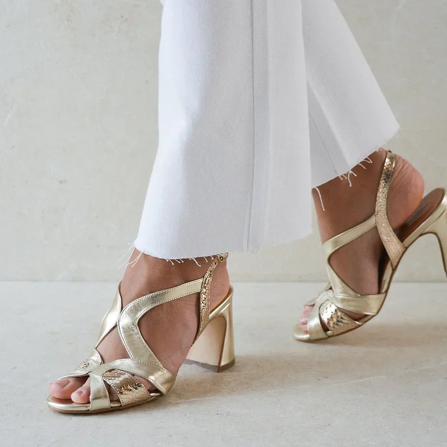 Wide cut-out glossy peep toe heels with an irregular design