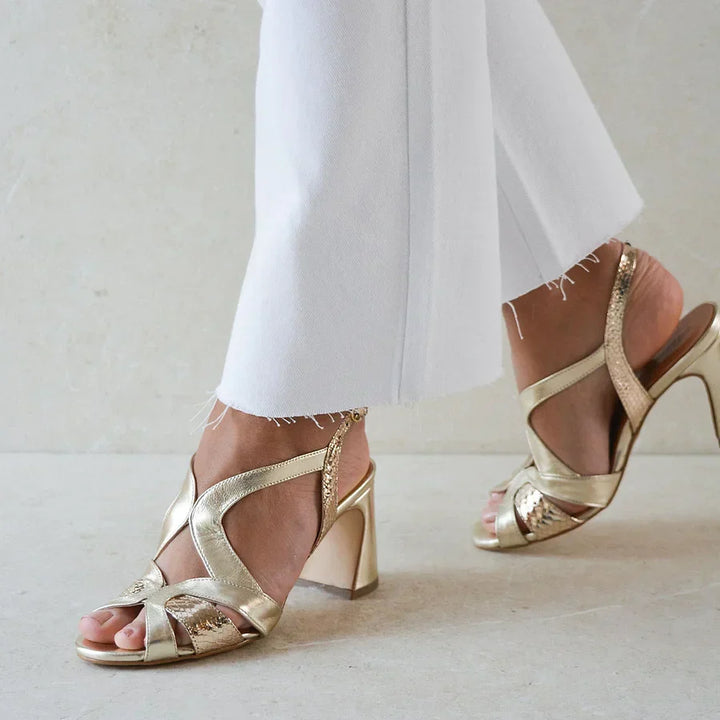 Wide cut-out glossy peep toe heels with an irregular design