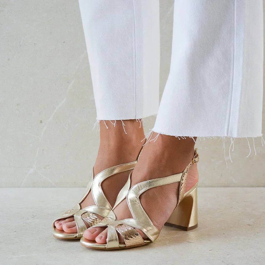 Wide cut-out glossy peep toe heels with an irregular design