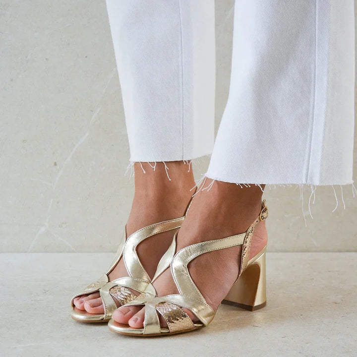 Wide cut-out glossy peep toe heels with an irregular design