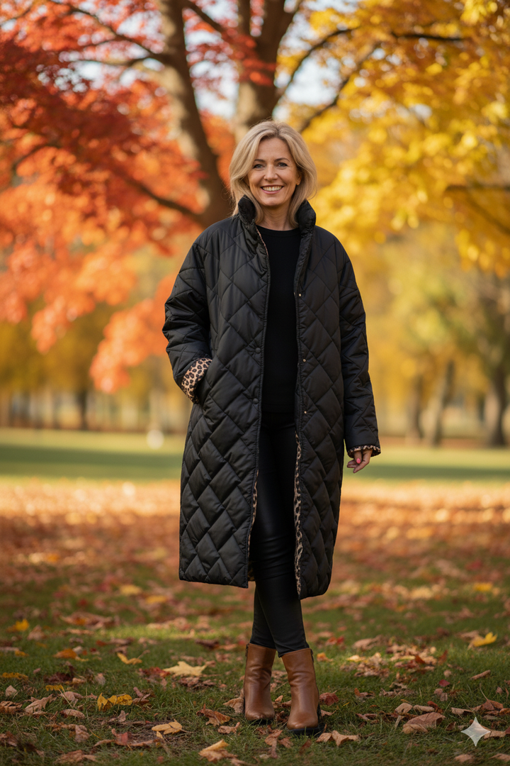 Black reversible quilted jacket with leopard print lining, long buttoned coat sleeves