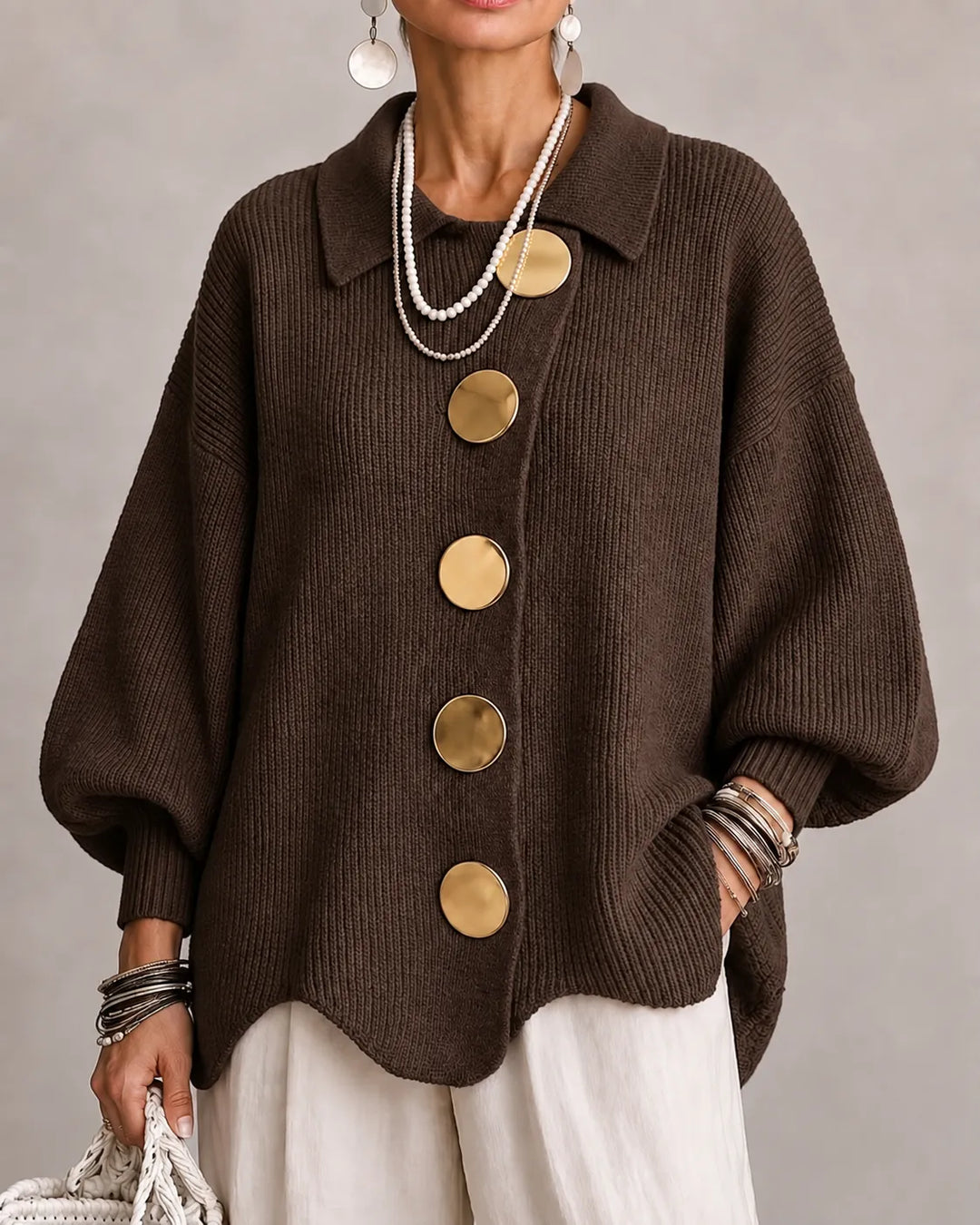 Brown oversized knit sweater with collared neckline and gold button front