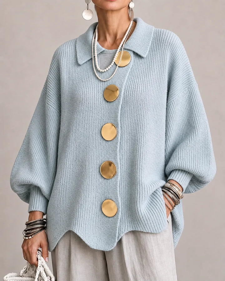 Light blue oversized knit sweater with collared neckline and gold round button front