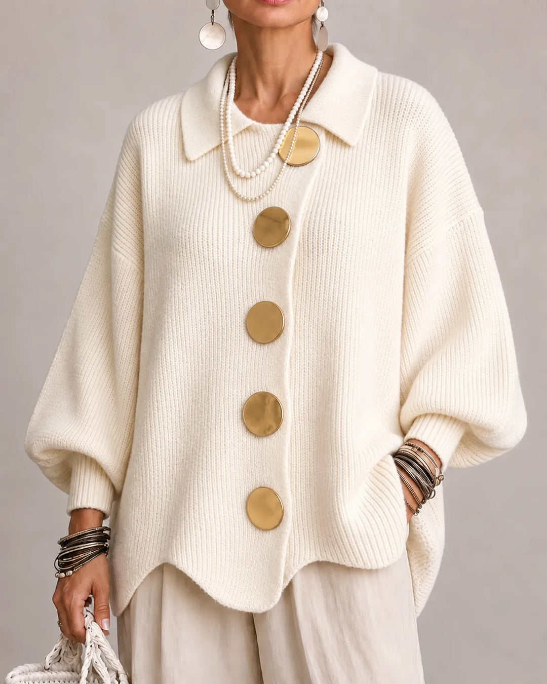 Ivory oversized knit sweater with shirt collar and gold round button front