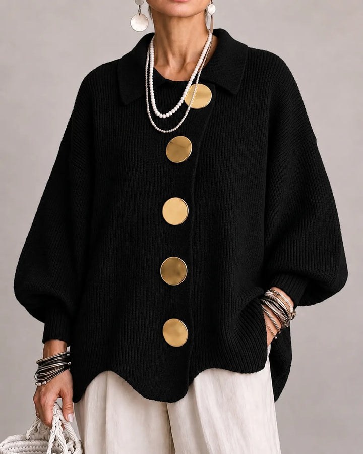 Black oversized knit sweater with collared neckline and gold button front