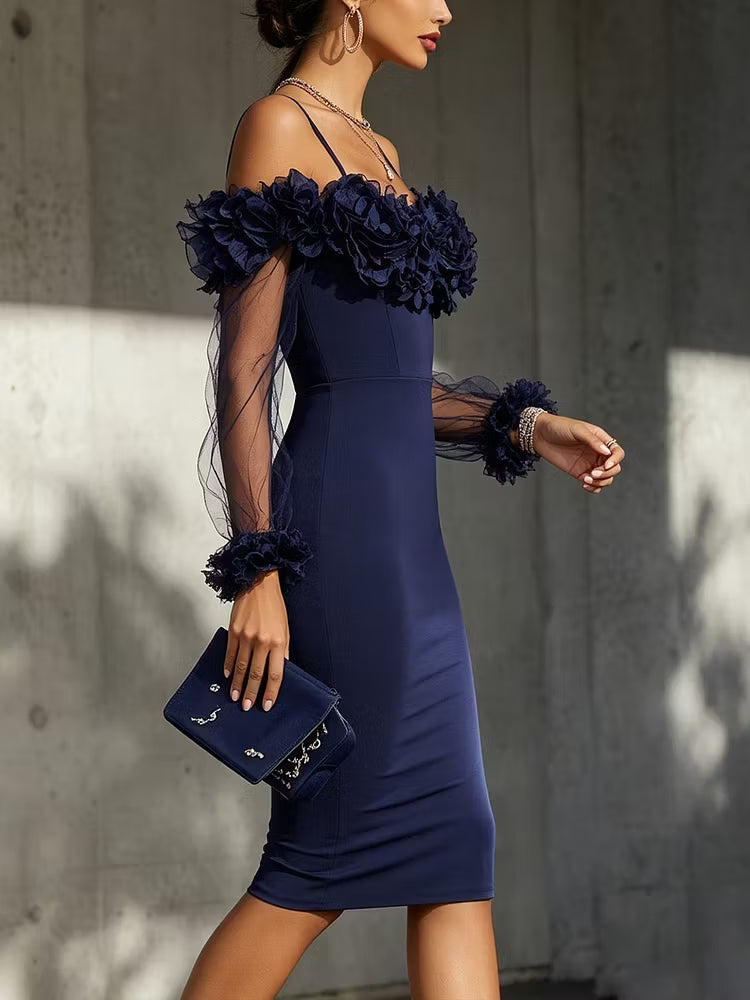 Navy blue midi dress with a fitted silhouette, off-the-shoulder design, and three-dimensional floral embellishments