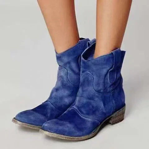 Dark blue suede orthopaedic ankle boots with pull tabs and stacked heel