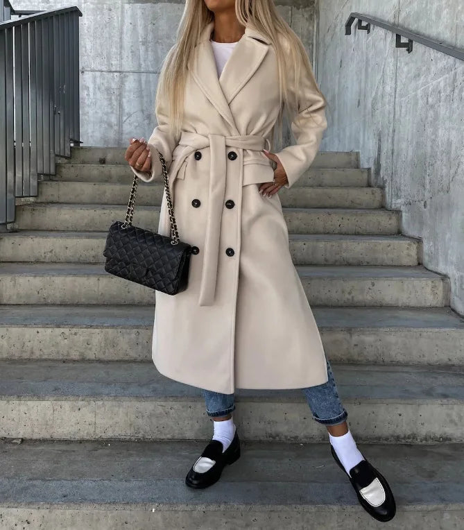Light khaki long sleeve trench coat with tie belt and double-breasted button front