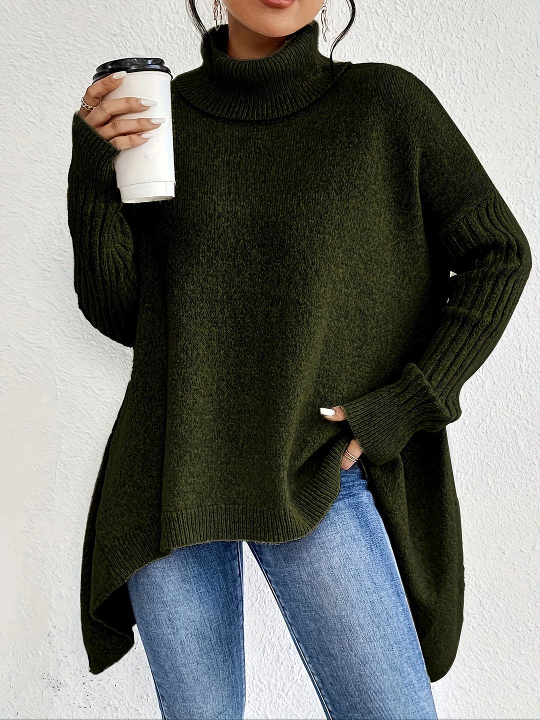 Dark green high-neck asymmetric hem knit sweater with long ribbed sleeves
