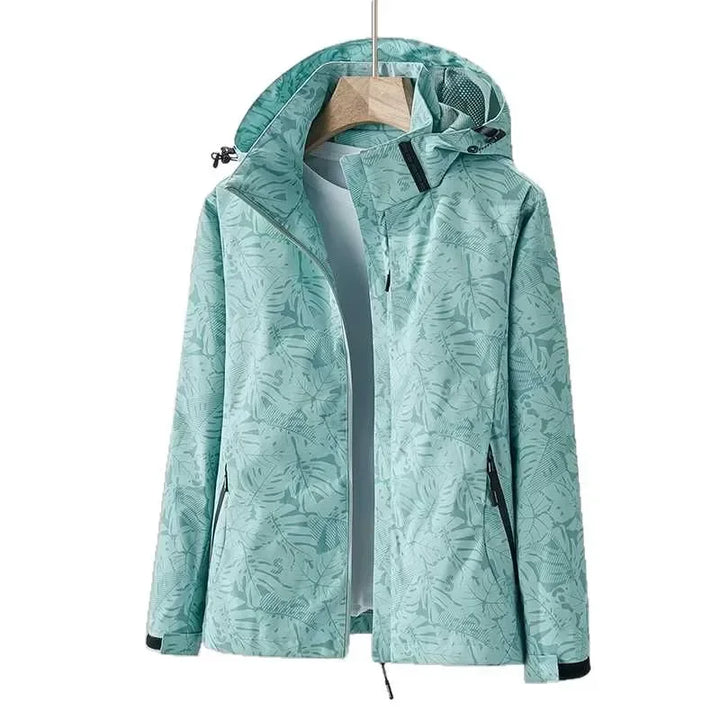 Mint green waterproof hooded jacket with front zip and side pockets