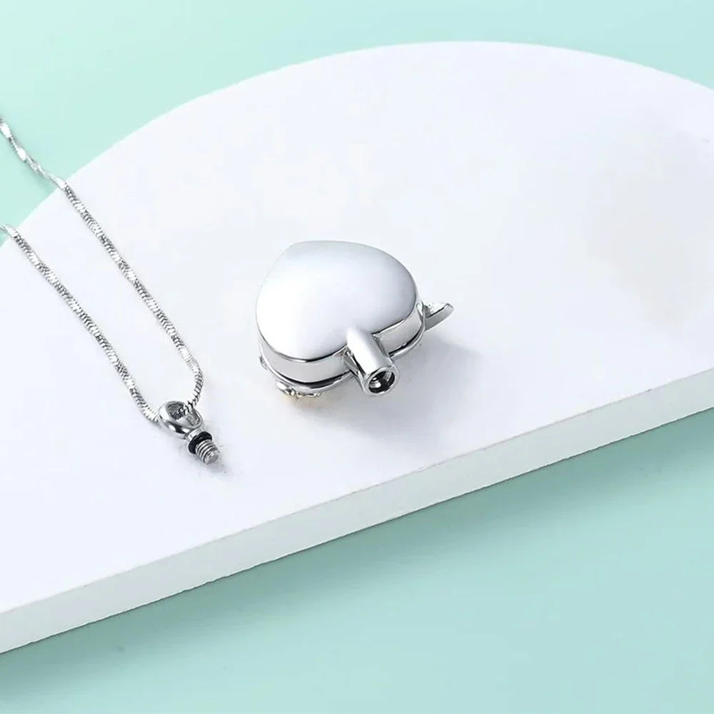 Silver chain with round heart urn pendant and small clasp