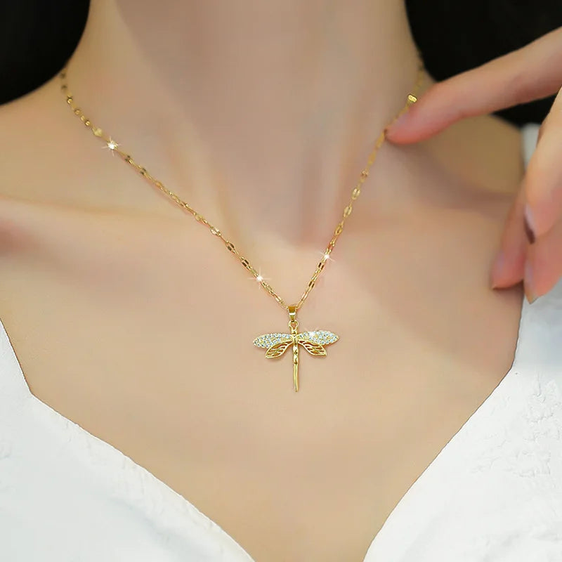 Gold dragonfly pendant necklace, crystal wings on a fine chain