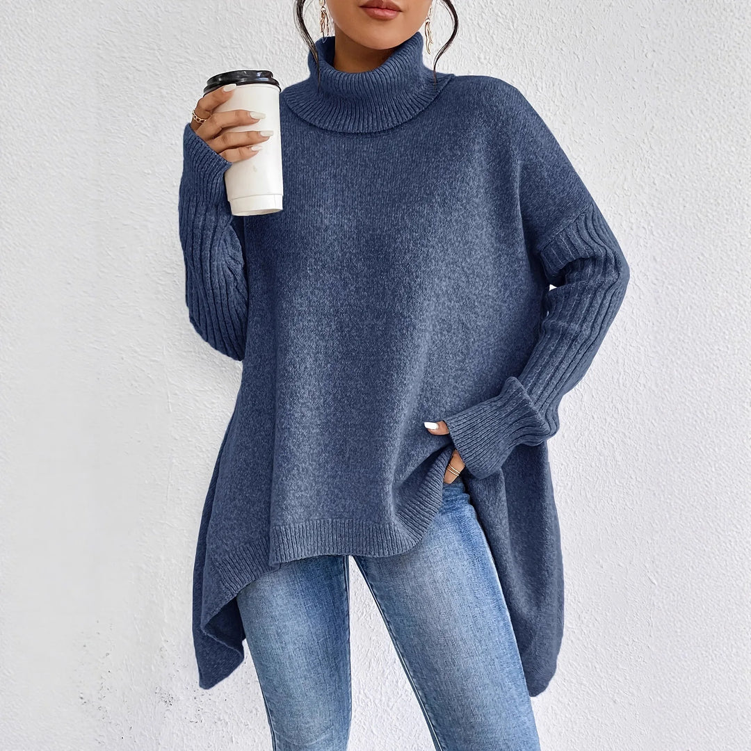 Blue high-neck asymmetric hem knit sweater with draped side panels and ribbed cuffs