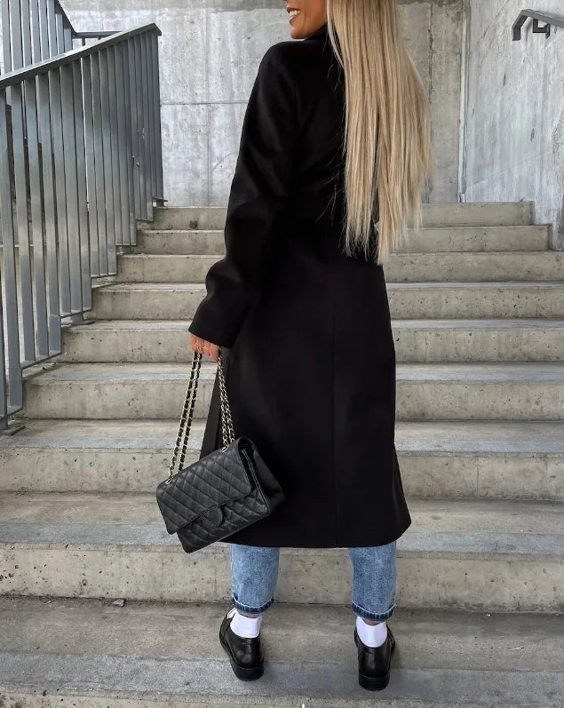 Black long sleeve trench coat with belt and double-breasted buttons