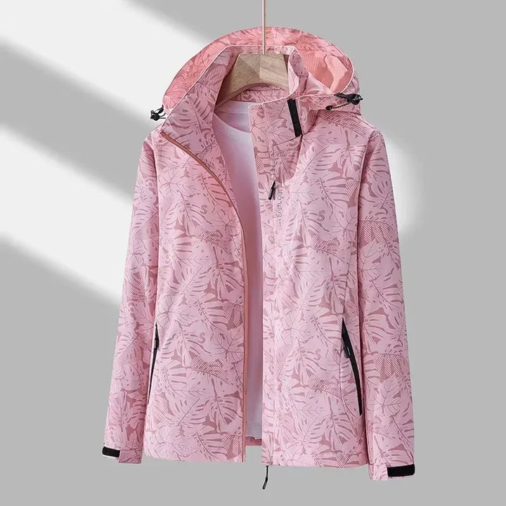 Pink waterproof hooded jacket with front zip and adjustable drawcord hem
