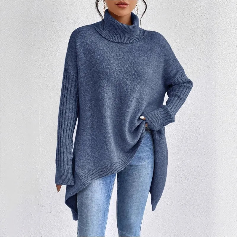 Blue high-neck asymmetric hem knit sweater with ribbed cuffs and angled side drape