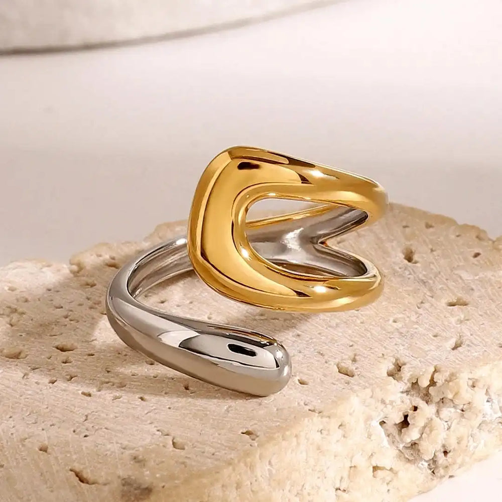 Two-tone open ring with gold center detail and shiny silver band