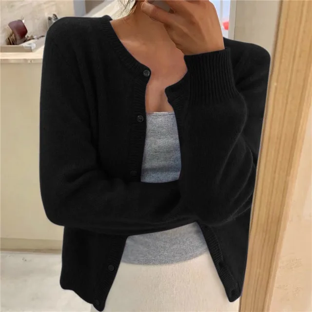 Black soft-knit cardigan with button front, round neck, long sleeves, ribbed cuffs and hem