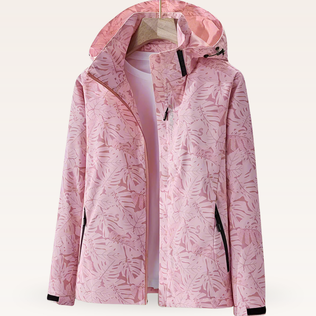 Women’s waterproof hooded jacket in pink with leaf print, full zip and side pockets