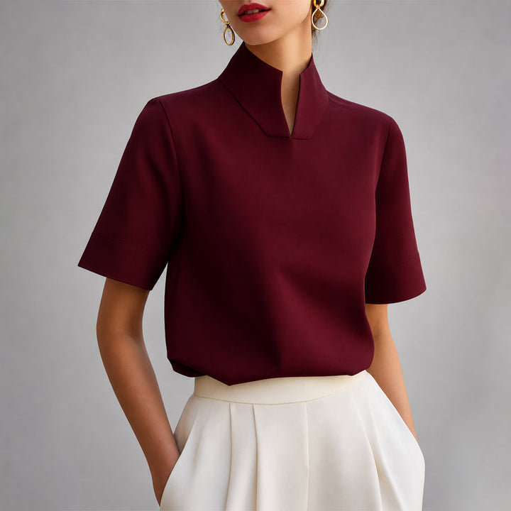 Burgundy structured mock-neck V-cut blouse with short sleeves