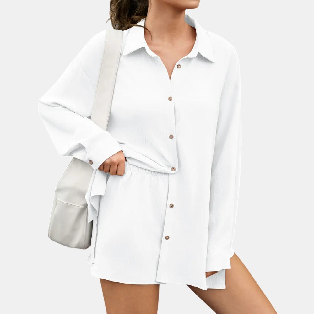White long-sleeve button-front blouse with matching high-waisted shorts two-piece set