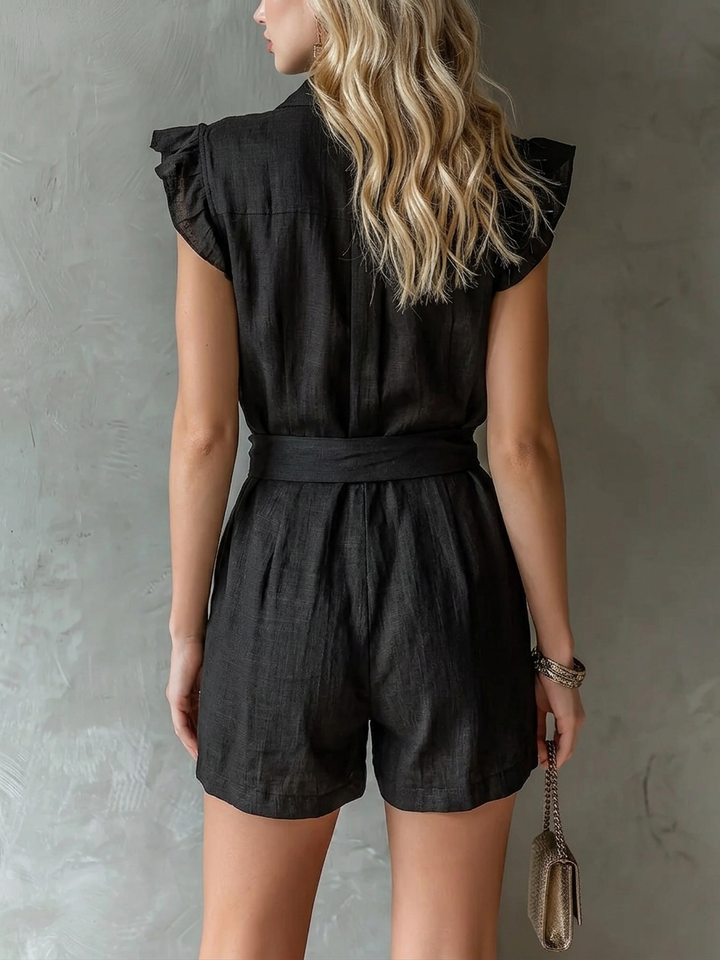 Black, sleeveless tie-front jumpsuit with collar