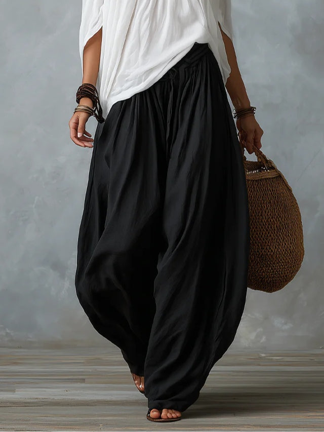 White Off-the-Shoulder Top and Loose-Fitting Lantern Trousers