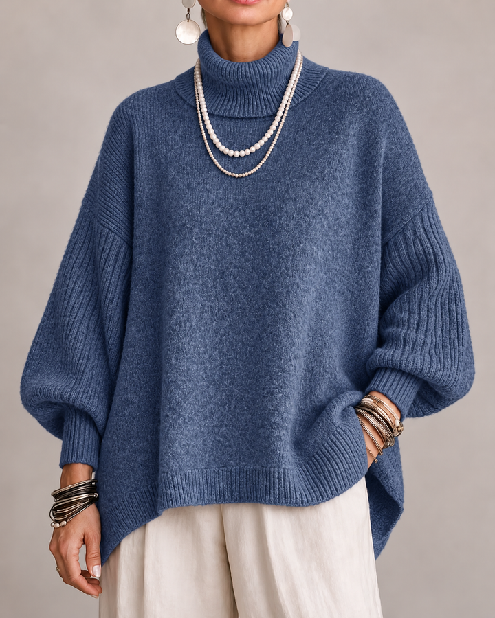 Blue turtleneck knit sweater with relaxed wide sleeves