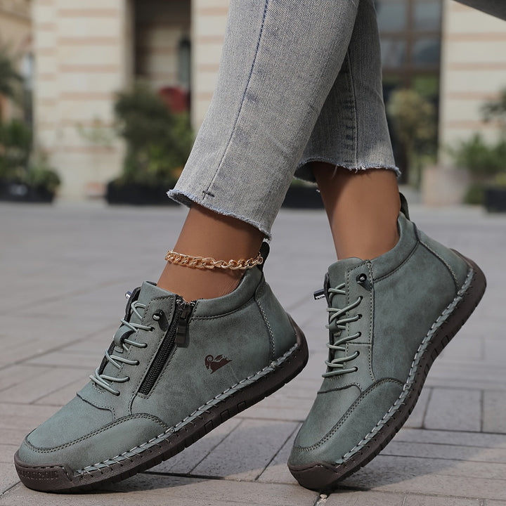 Dark olive lace-up comfort shoes with side zipper and gold chain ankle strap