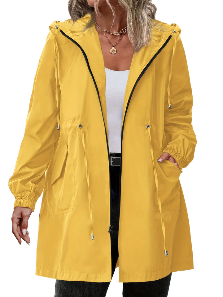 Lightweight hooded zip jacket in mustard yellow with drawstring waist and front pockets