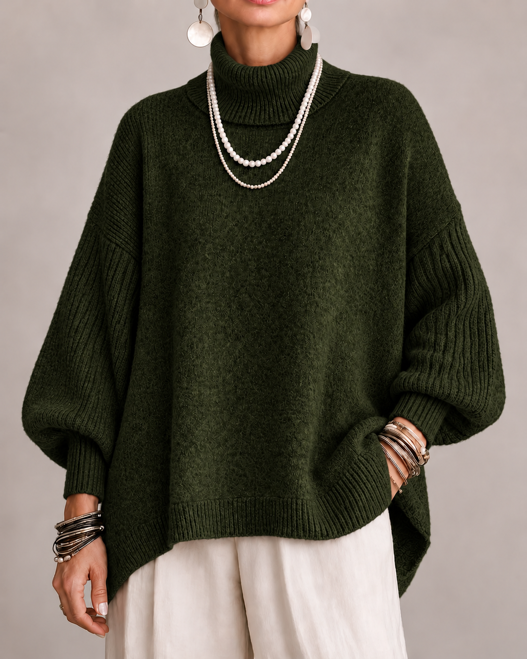 Dark green turtleneck knit sweater with relaxed wide sleeves